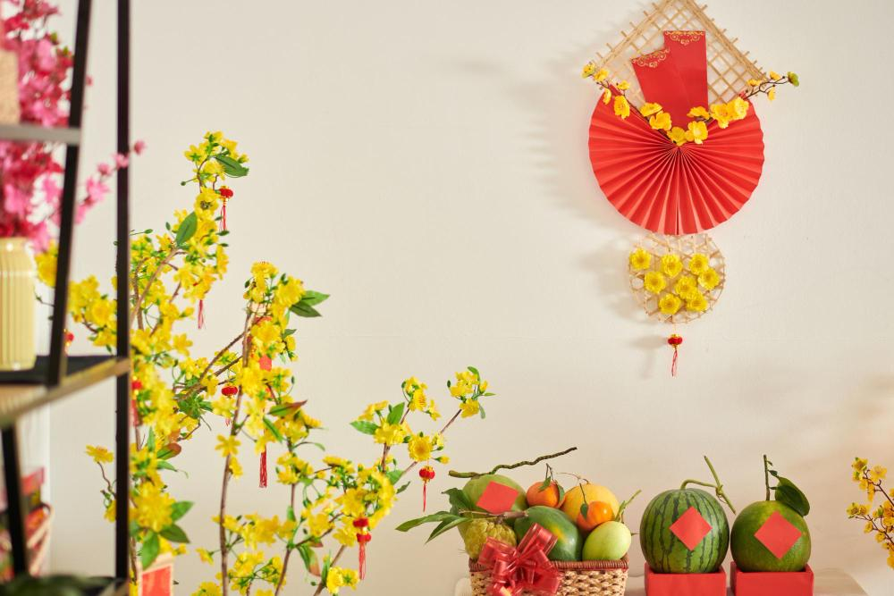 People in Southern Vietnam often display apricot blossoms with fruit trays on the Lunar New Year holiday to pray for luck and fortune